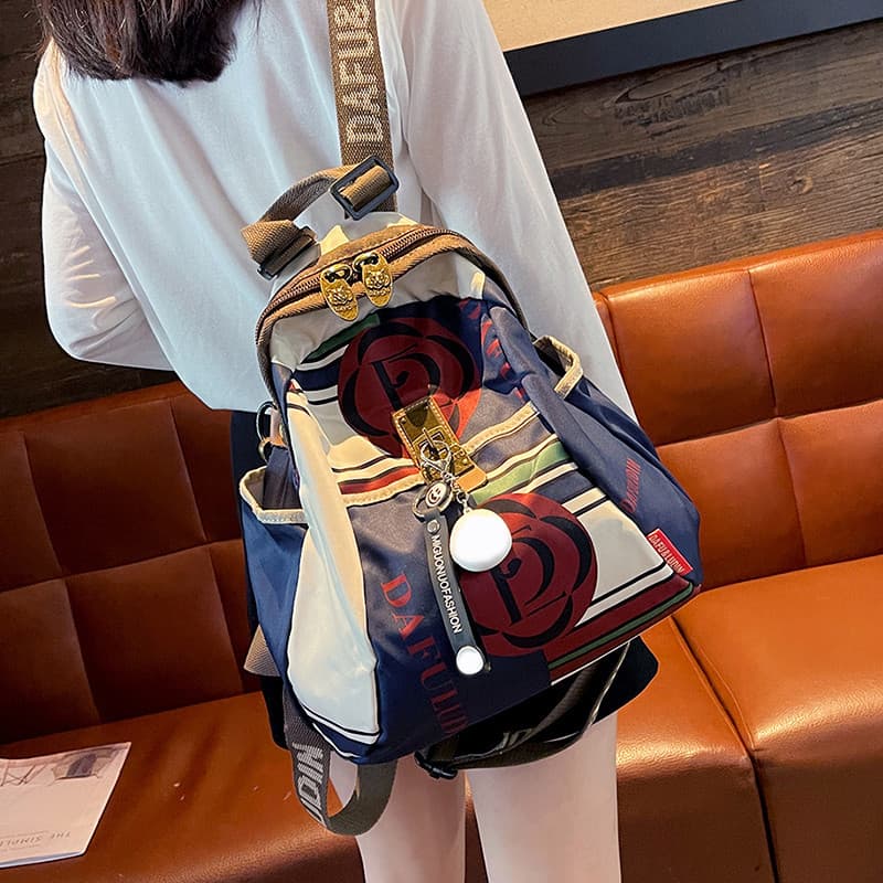 Street Wear impressão mochila de viagem de grande capacidade feminina 2026 novo Casual All-Match Oxford pano senhoras mo