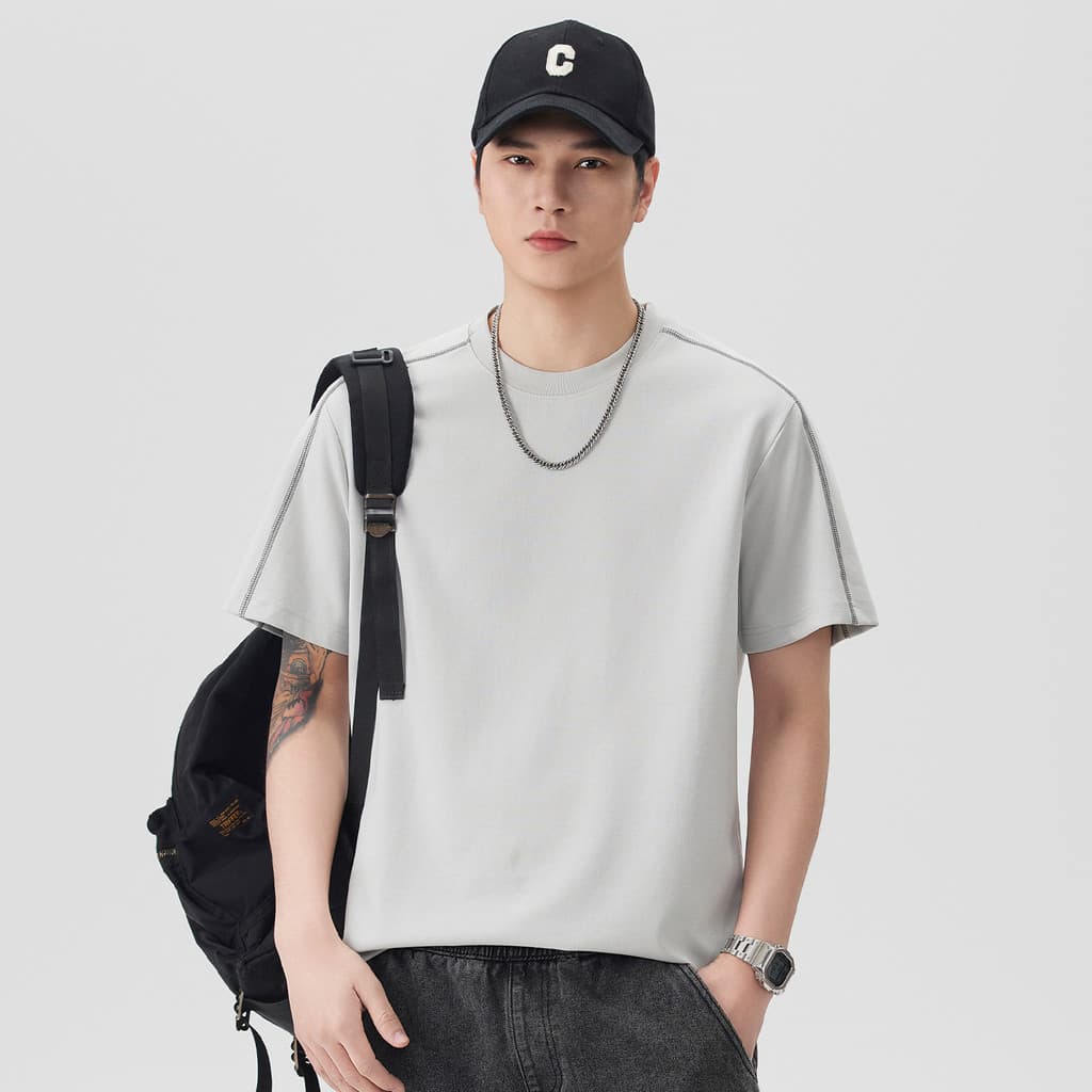 Camiseta de manga curta masculina 2026 novo estilo Street Wear desconstrução costura simples nicho Design boxy meia mang