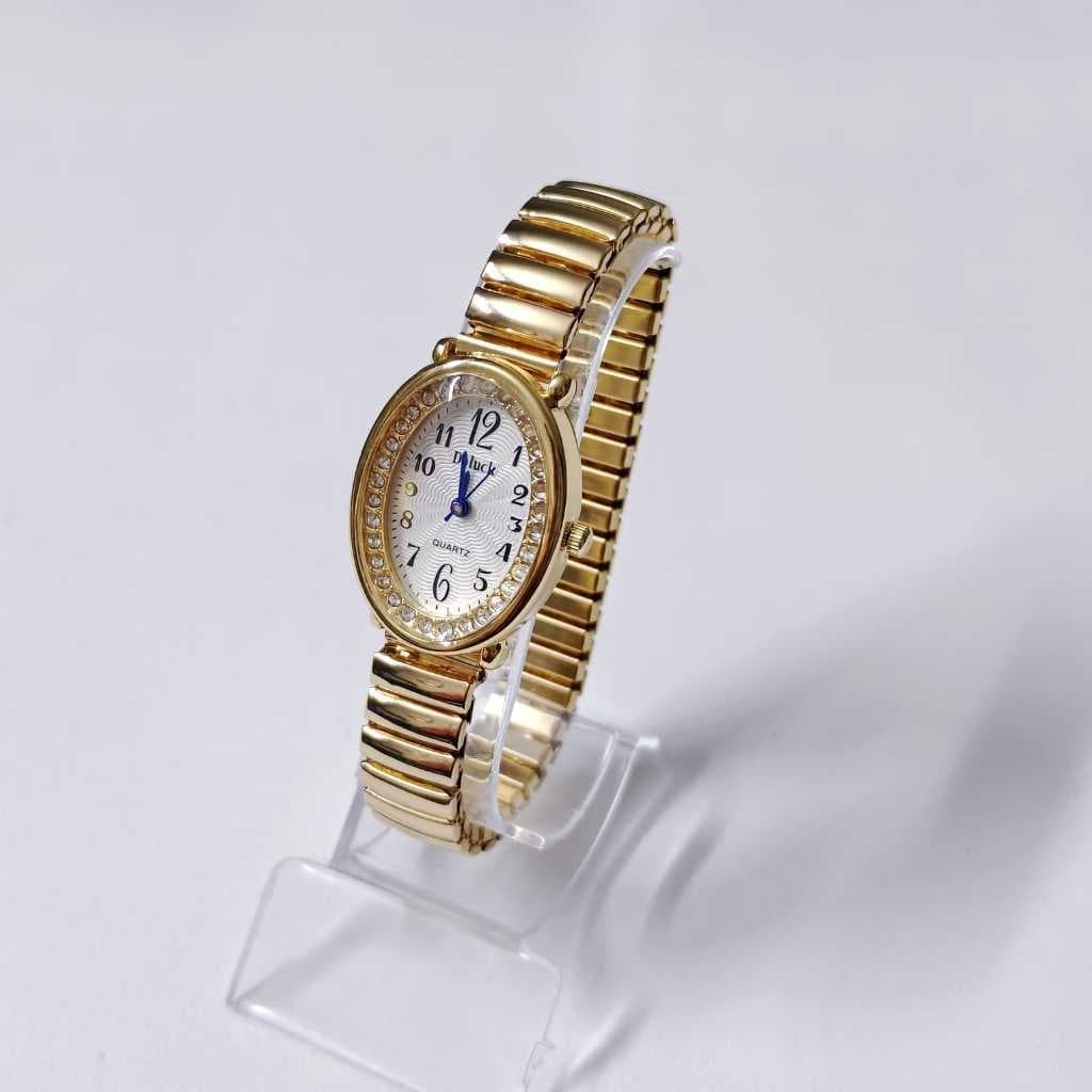 Relógio MOLA PULSEITA ELASTICO  feminino,delicado minimalista,com mini pequeno mostrador,formato oval,com pedra