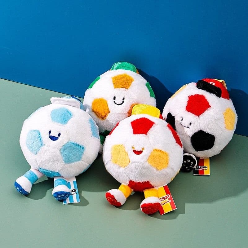 Boneca tinta presente 2026 pé das crianças bonito pingente bola de pelúcia mascote cérebro câmera masculino copa do mund
