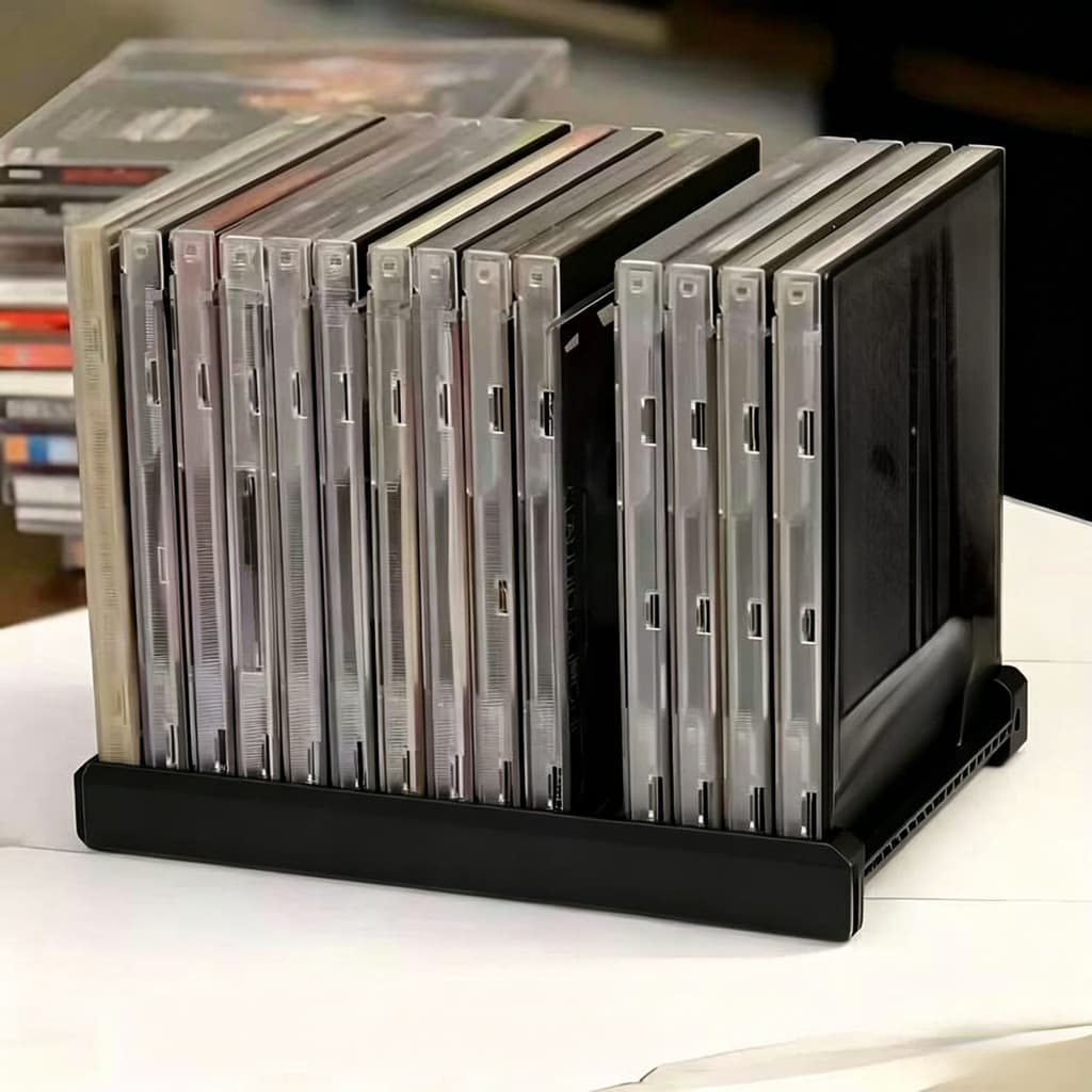 Caixa de armazenamento de CDs para 15 discos, empilhável com design de encaixe. Caixa de armazenamento de CDs com enca