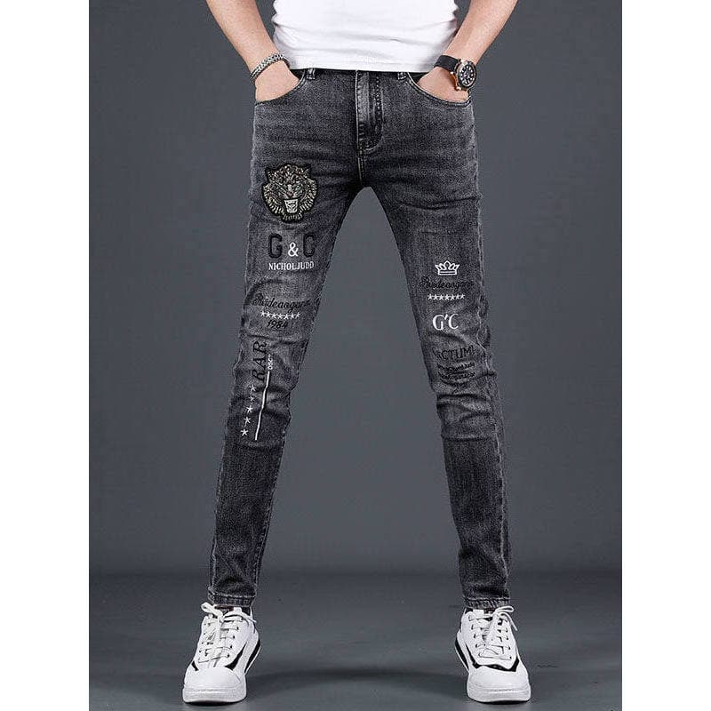 2026 primavera novo estilo rasgado Jeans masculino estiramento fino ajuste em linha reta pés pequenos bordado All-match
