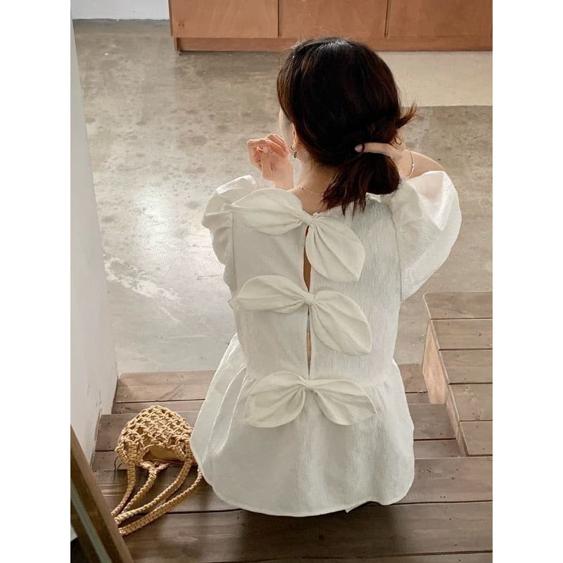 Voltar arco Design sentir nicho chique topo feminino início da primavera estilo francês manga Puff coreano doce chique c