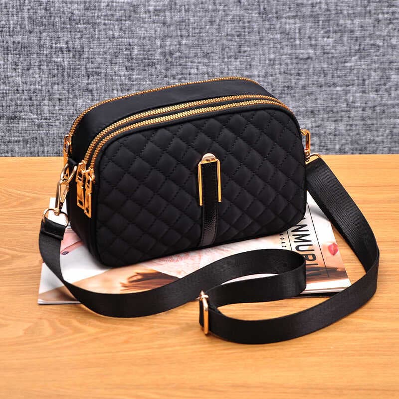 Bolsa de pano Oxford feminina bolsa mensageiro de verão 2026 novo estilo diamante atmosférico mulheres idosas de meia-id