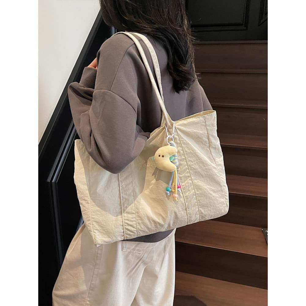 Bolsa de lona Casual de grande capacidade feminina 2025 novo estilo versão coreana simples bolsa de viagem de um ombro A