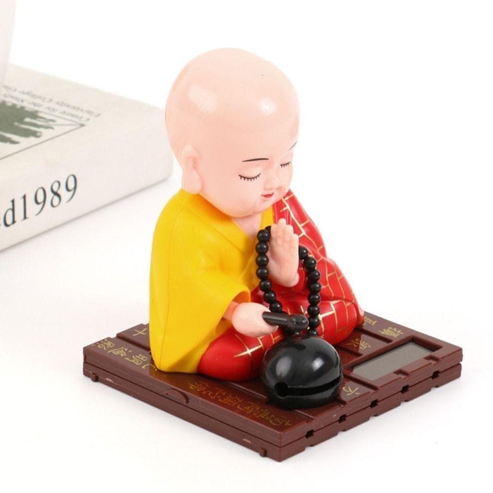 Brinquedo de pesca que atrai fortuna, artesanato de Buda acenando movido a energia solar, prosperidade chegando.