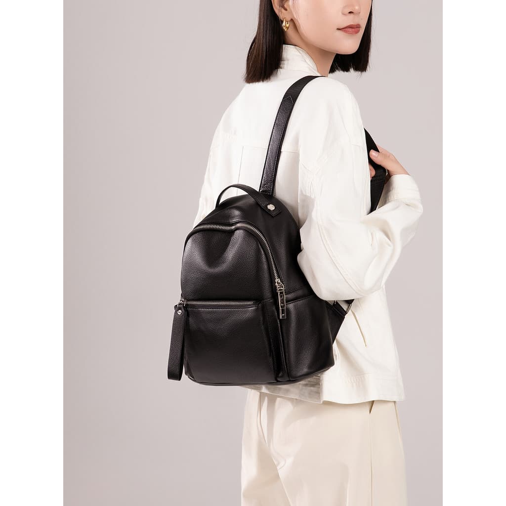 Mochila de couro genuíno feminina 2026 novo estilo diário Commuter All-Match mochila estudante universitário grande capa