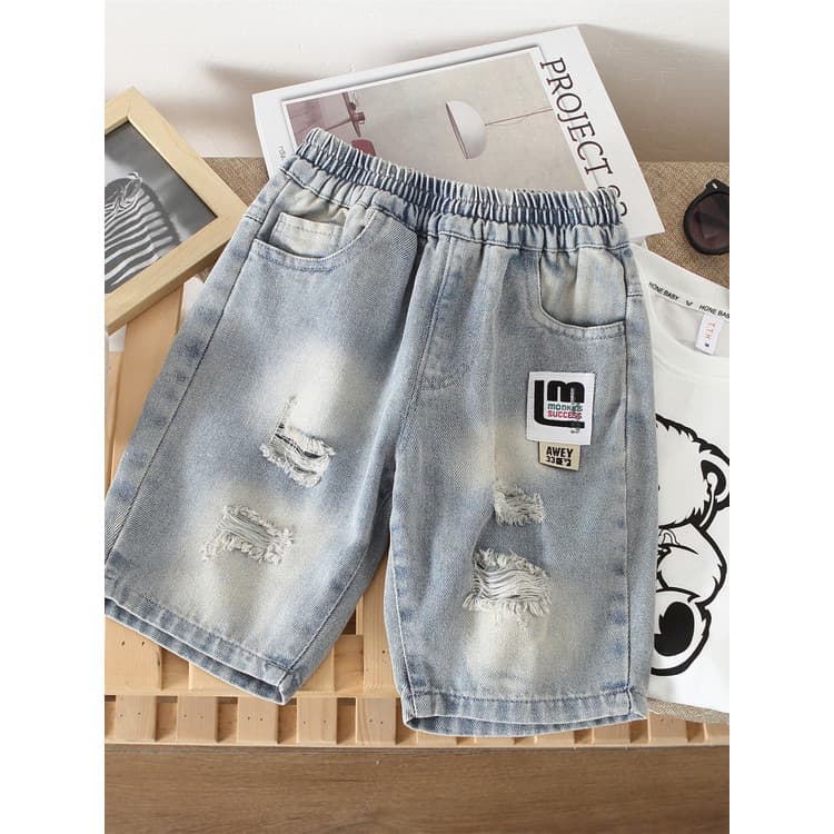 Meninos calças de verão 2026 novo estilo crianças fã coreano legal bonito Denim calças de cinco pontos menino bebê verão
