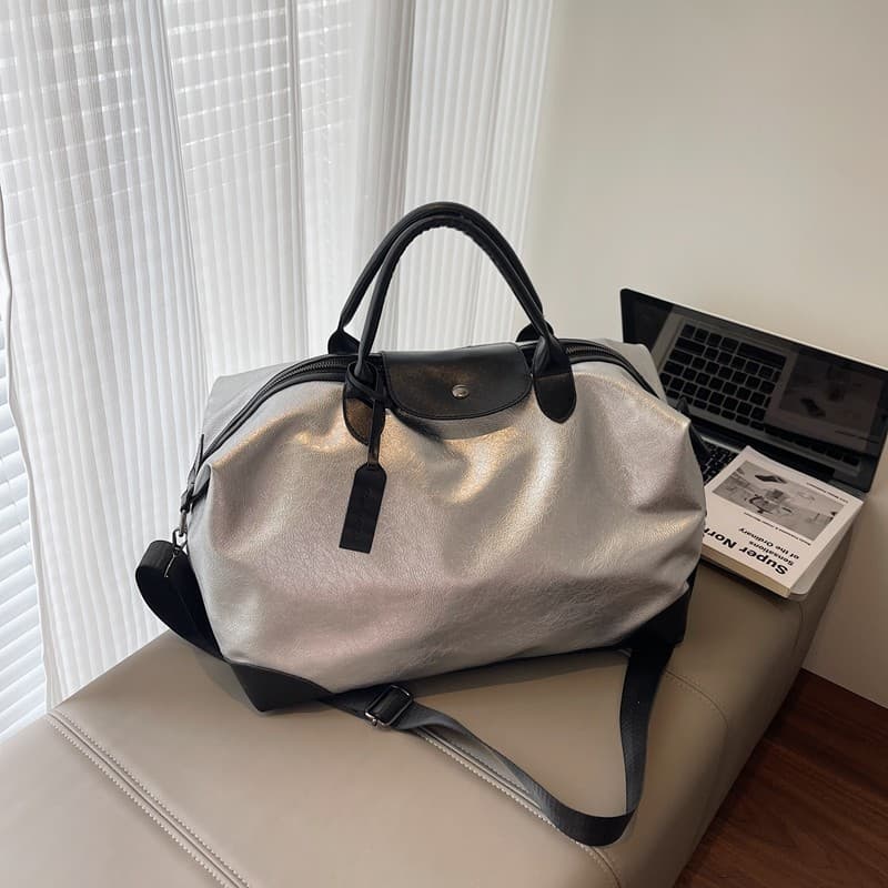 Bolsa de viagem de curta distância 2026 novo estilo bolsa de bagagem de grande capacidade bolsa de armazenamento feminin