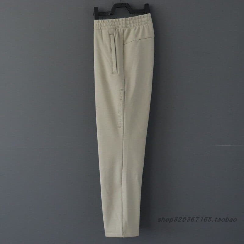 Anta Calças masculinas outono inverno estilo denso quente lã quente reta estiramento treinamento de malha152447315N