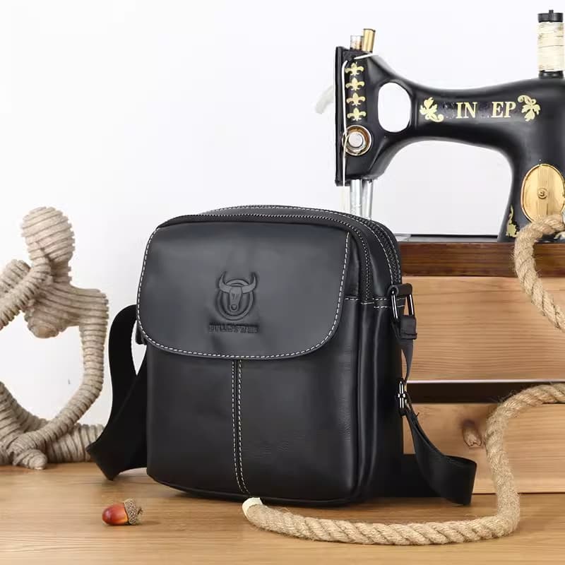 Capitão Niu bolsa mensageiro de ombro de couro genuíno masculina Casual na moda versão coreana bolsa juvenil capa de cou