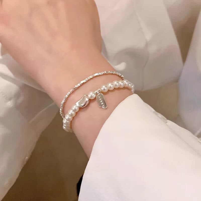 Ultra-fino quebrado prata pérola pulseira feminina 2026 novo estilo High-End luz luxo nicho requintado empilhado pulseir