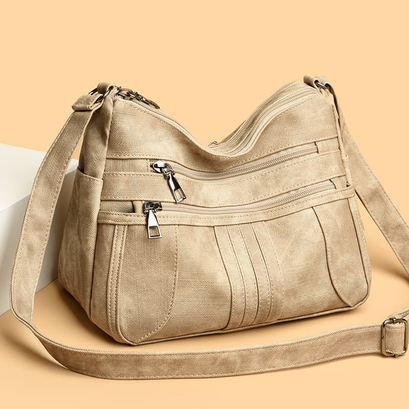 Retro saco de couro macio feminino venda quente novo estilo moda Casual All-match elegante nicho de um ombro Commuter Di