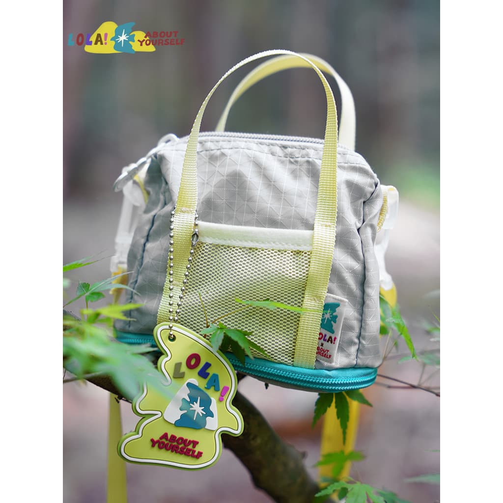 Guan Jimanye leve Asuka saco do mensageiro Mini Casual All-Match portátil extensível bolsa de armazenamento de passaport