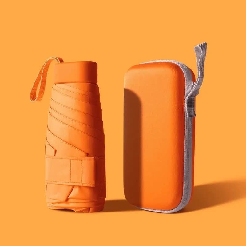 Guarda-Sol Portátil Cápsula UPF50+ com 6 Varetas Reforçadas – Dobrável e Compacto, Ideal para Praia, Piscina e Viagens