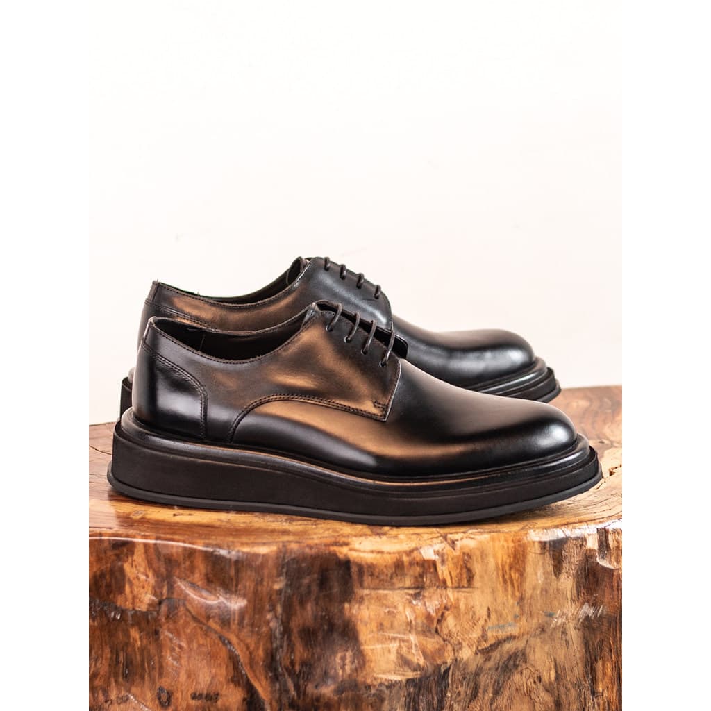 Rico na moda sapatos estilo britânico dedo do pé redondo Derby masculino na moda couro genuíno sapatos de couro casuais