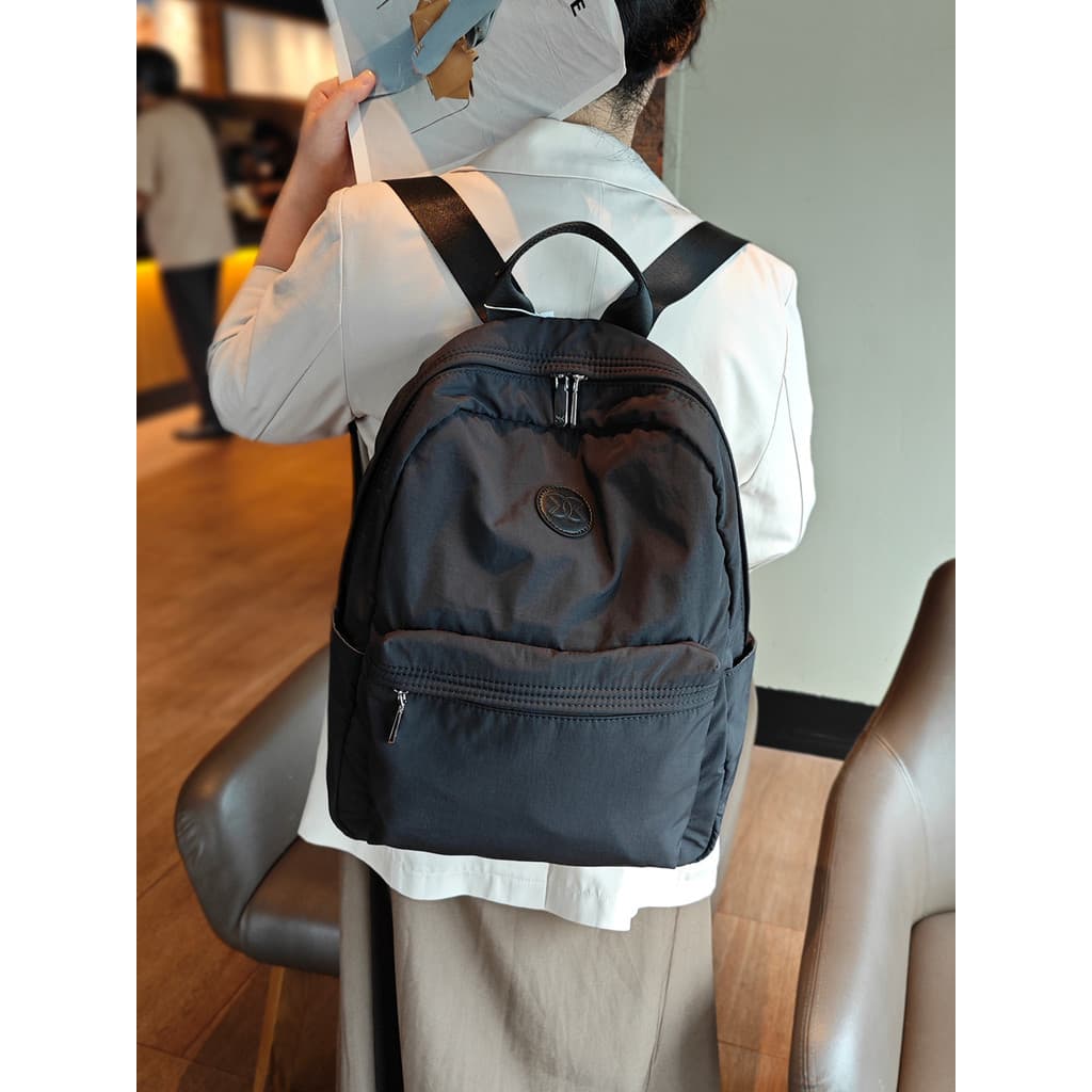 Pele sentir tecido mochila feminina 2026 novo estilo moda mochila de viagem Casual All-Match grande capacidade lona saco