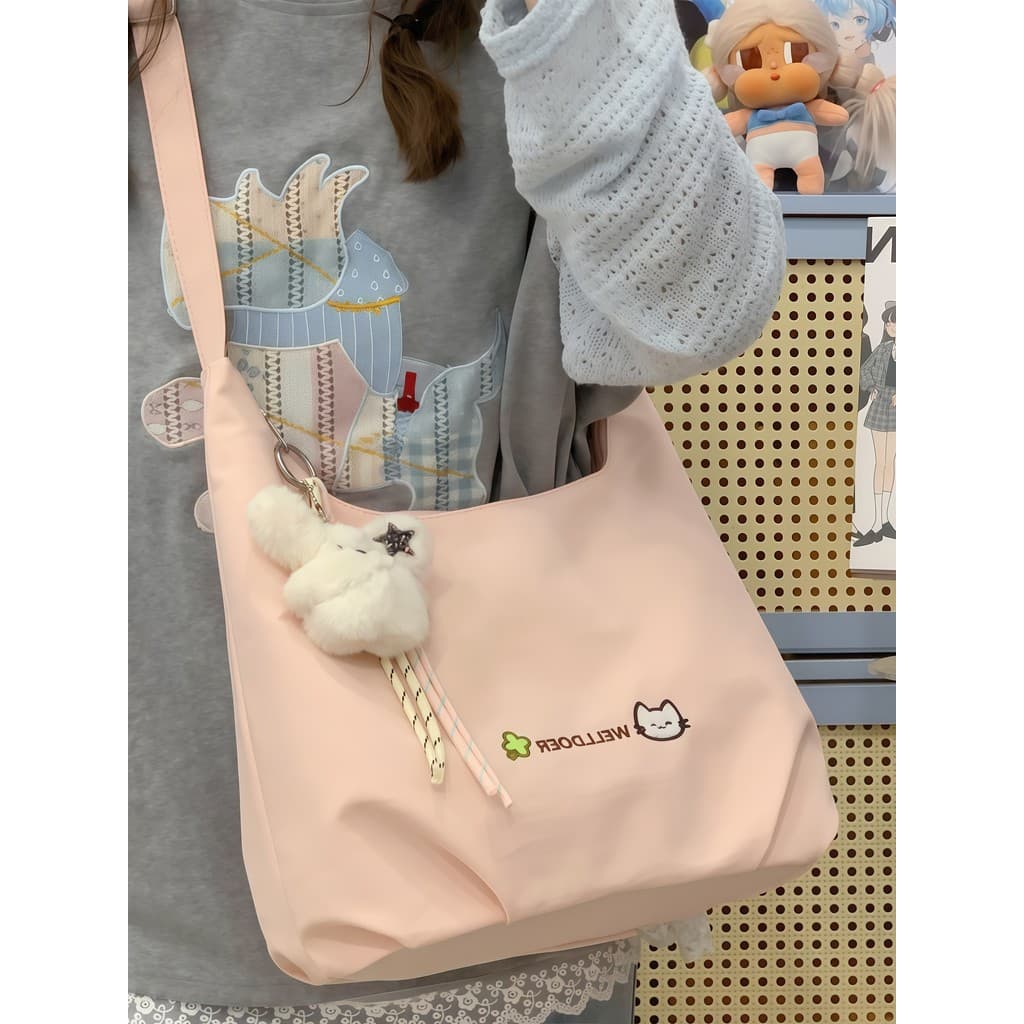 Bolsa mensageiro feminina de grande capacidade 2026 novo estilo Super bonita bolsa feminina High-End pano estudante Comm