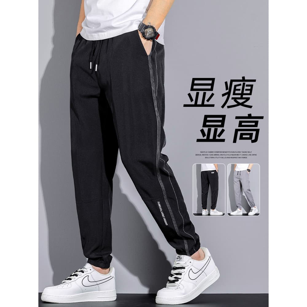 Calças casuais masculinas 2026 venda quente Street Wear calças soltas verão fino preto estiramento calças esportivas mas