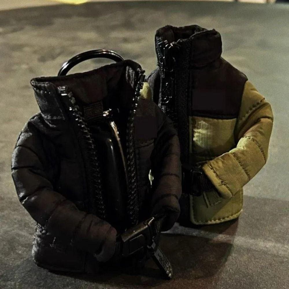 O novo chaveiro para casacos da é um acessório de bolsa mini, simples e portátil, um ornamento feito à m