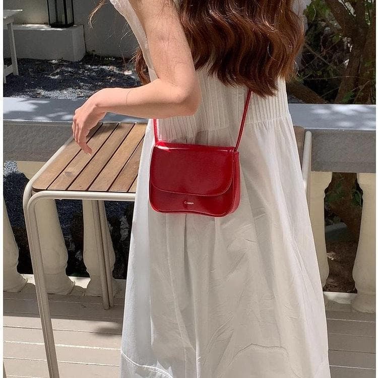 bolsa feminina bolsa transversal feminino Nicho Retro vermelho saco feminino 2025 novo estilo simples temperamento sela