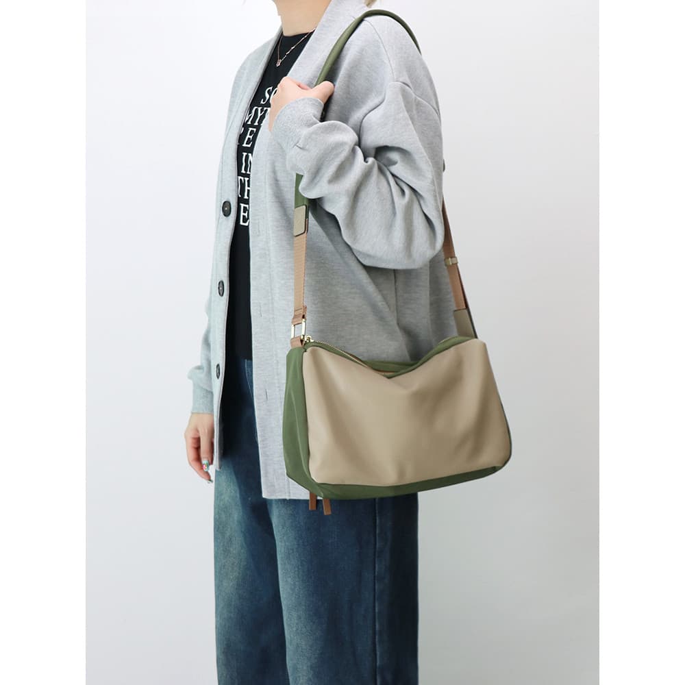 Pano impermeável leve e elegante com bolsa mensageiro de couro genuíno feminina 2025 novo estilo nicho Design contraste