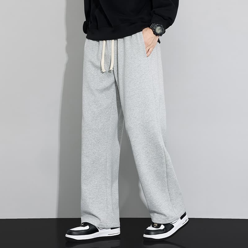 Novo produto calças esportivas estilo masculino cinza outono perna larga solta olhar alto 2025 novo estilo em linha reta