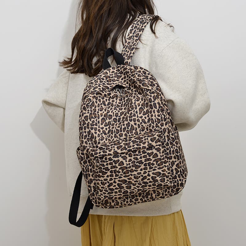Versão coreana na moda mochila de lona masculino feminino estudante mochila estilo Preppy impresso mochila de armazename