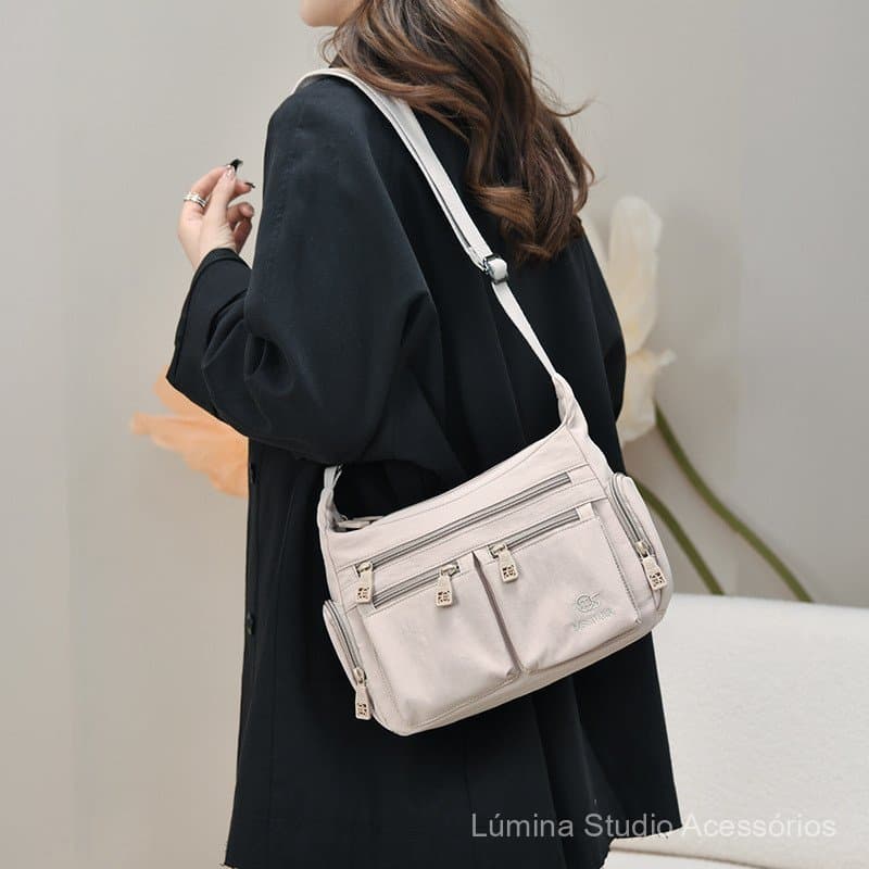 Nova bolsa de ombro leve com múltiplos compartimentos, bolsa transversal de grande capacidade para homens e mulheres.