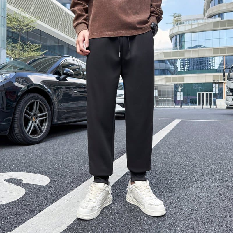 Calças masculinas de inverno calças masculinas engrossadas lã de cordeiro Casual Leggings calças soltas calças esportiva