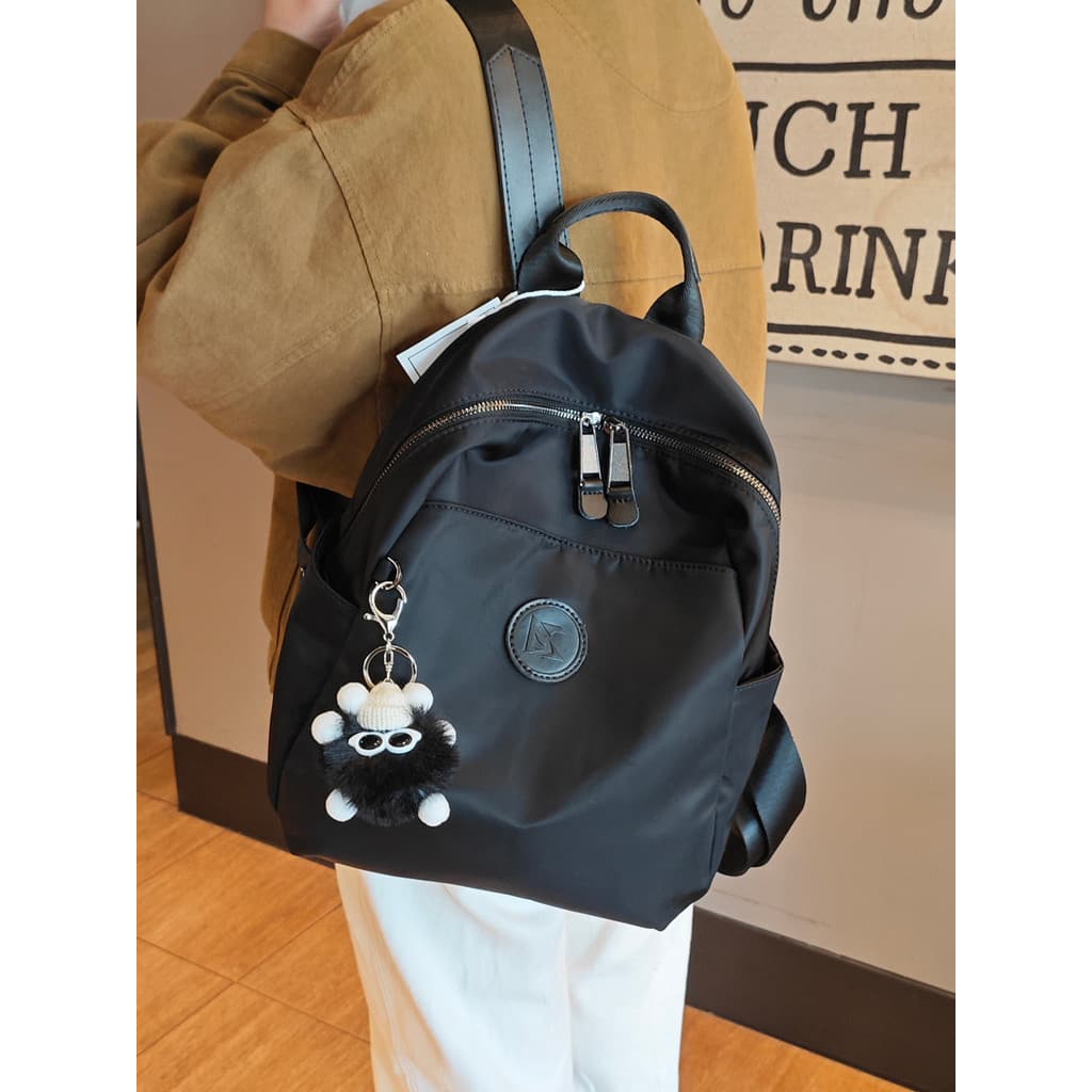 Mochila de viagem à prova d'água feminina 2026 novo estilo elegante All-Match mochila de grande capacidade viagem leve b