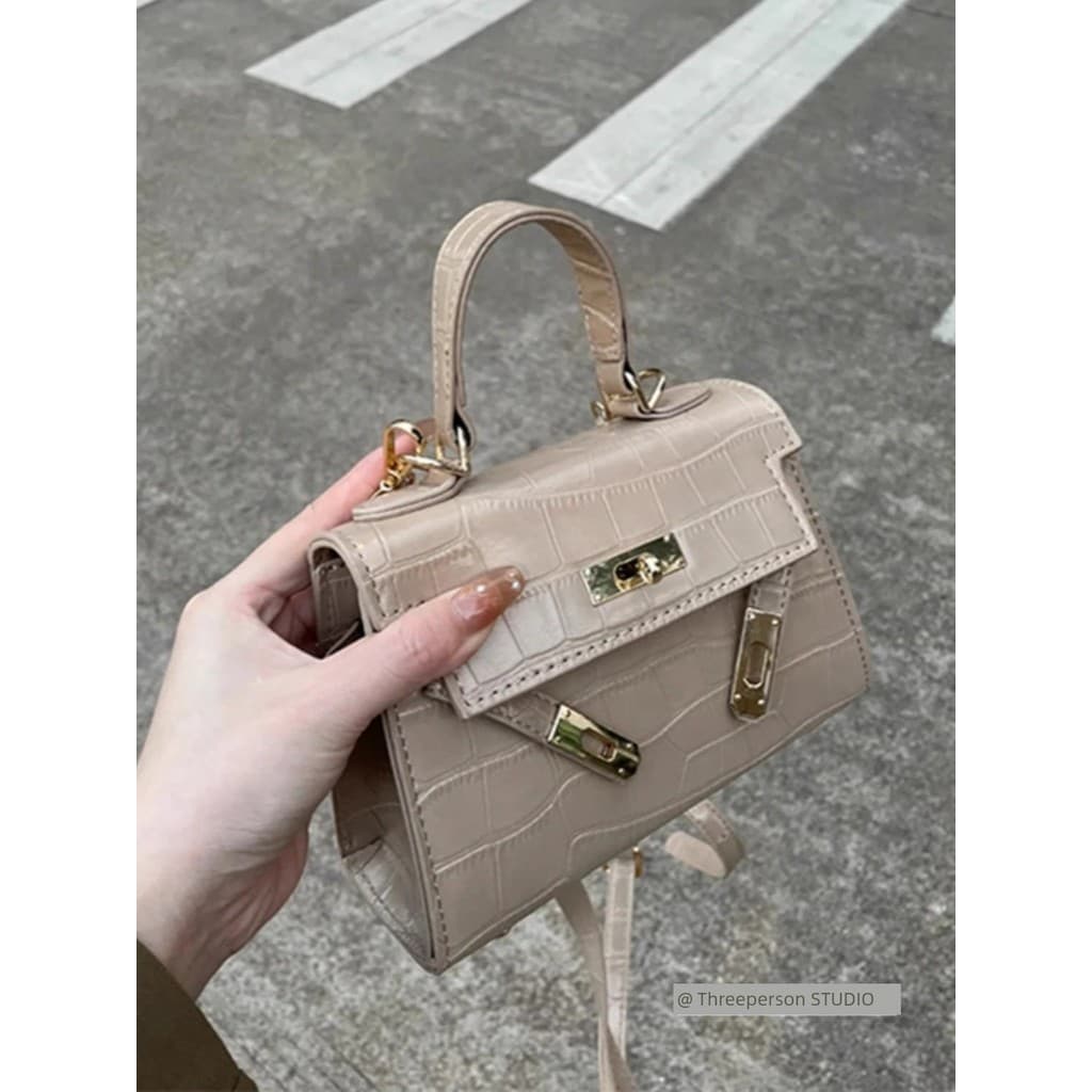 Bolsa bolsa feminina High-End textura mini Kelly saco feminino 2024 outono novo estilo luz luxo nicho Design bolsa mensa