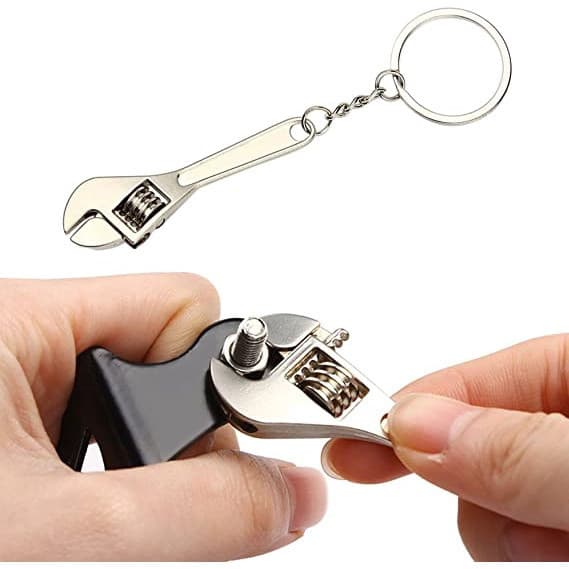 Mini chaveiro portátil criativo e prático, em formato de pingente/chave universal ajustável multifuncional de liga metál