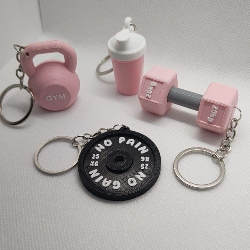 Kit 4 Chaveiros Academia Fitness: Haltere, Kettlebell, Anilhas e Shakeira