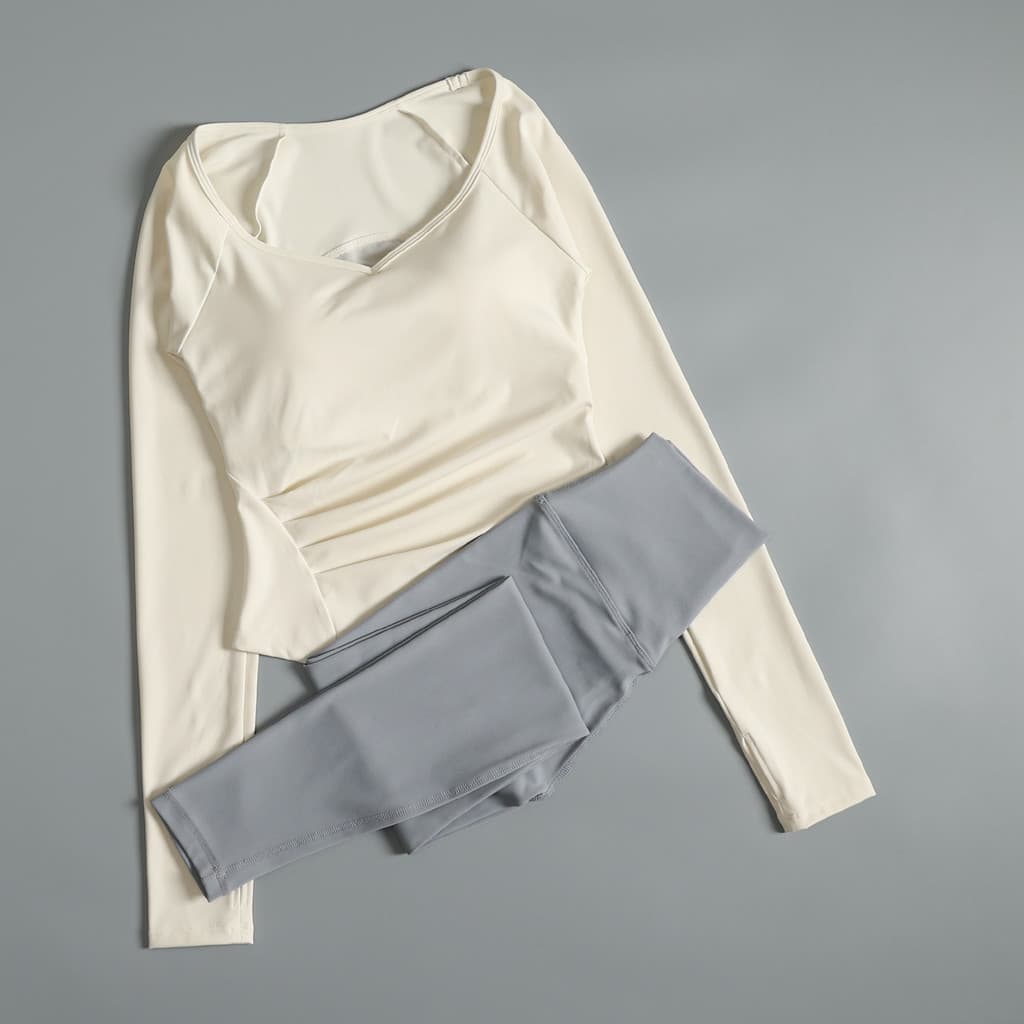 Yoga wear terno Pilates High-End sentimento bonito correndo esportes topo feminino com almofada no peito outono inverno