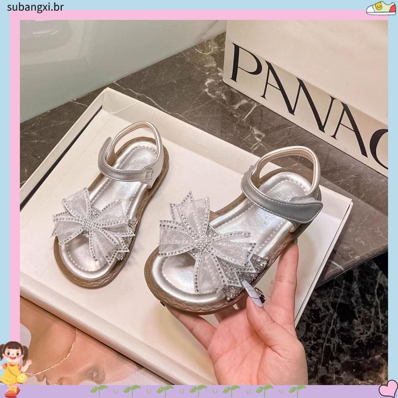 Meninas sandálias 2026 verão novo estilo estudante sola macia arco aberto sapatos de princesa antiderrapante sapatos de