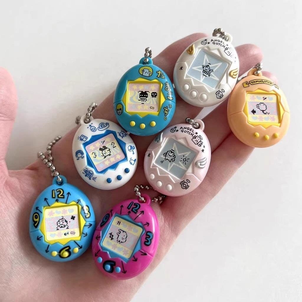 Bandai cápsula genuína brinquedo 90s nostálgico Console de jogo eletrônico animal de estimação Tuoma Gezi modelo pingent