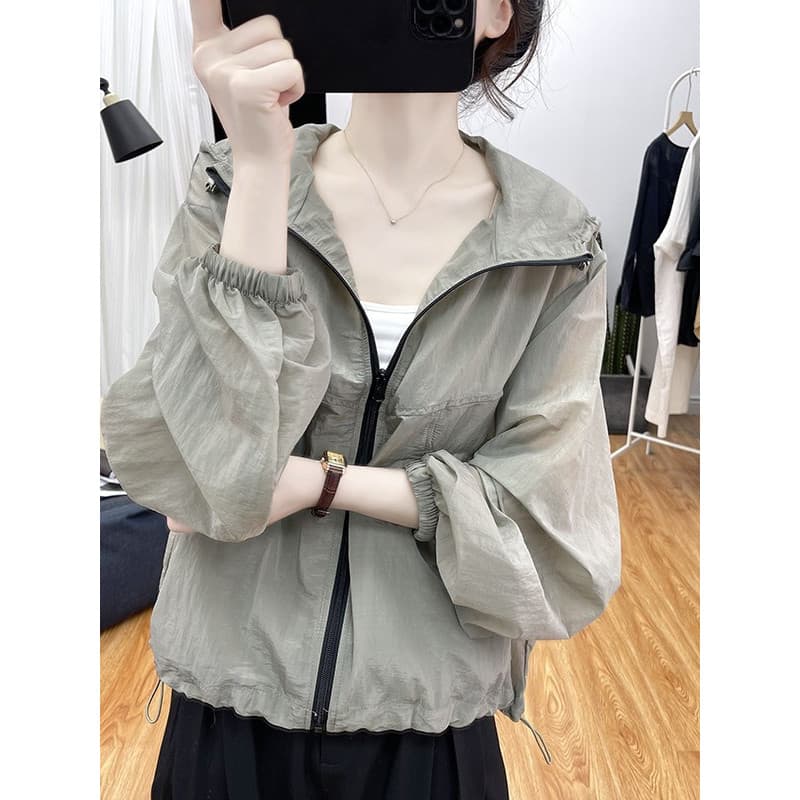 Design de moda de verão estilo fino protetor solar roupas femininas Cardigan solto topo 2026 estilo Hong Kong jaqueta fi