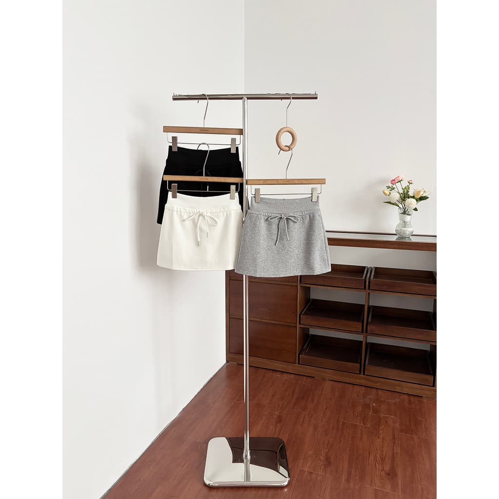 Estilo coreano estilo esportivo cintura alta saia com cordão feminino 2026 verão novo estilo All-Match mais magro olhar