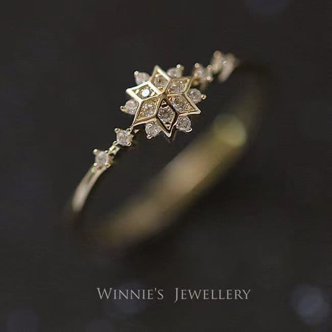 2026 novo estilo estilo japonês 18K ouro inverno floco de neve anel feminino na moda casamento temperamento elegante2026