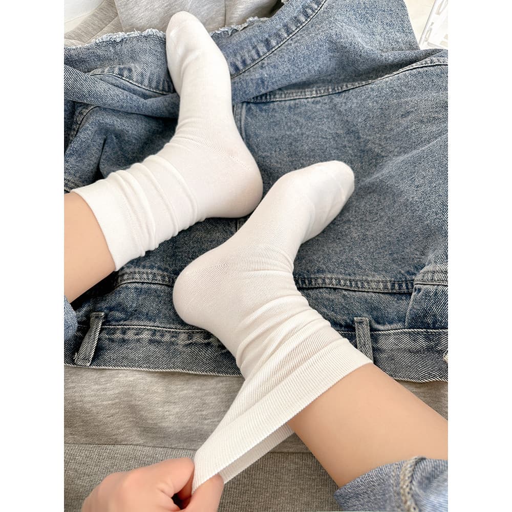 Meias de tubo médio de algodão puro femininas primavera outono meias de pilha meias de confinamento estilo Preppy meias