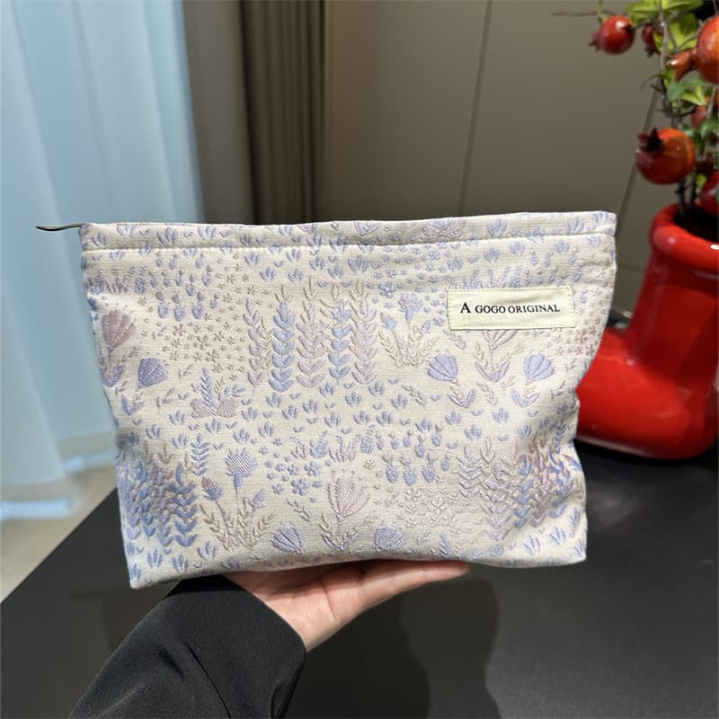 High-End sentimento pequeno fresco saco cosmético feminino forro portátil lona saco de armazenamento arrumado de grande