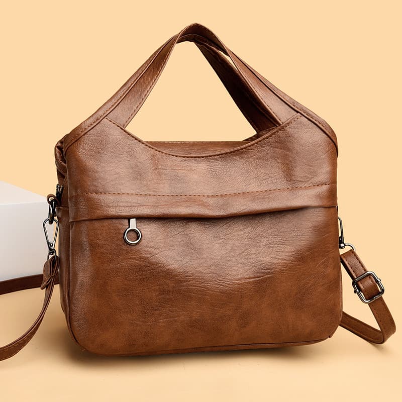 2026 novo estilo bolsa feminina Retro couro macio grande capacidade bolsa de ombro saco do mensageiro moda bolsa Commute