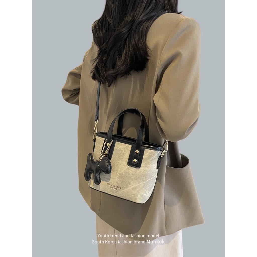 Mankok High-End Super quente pequeno saco feminino 2026 novo estilo de venda quente bolsa nicho luz luxo Cross-body bald
