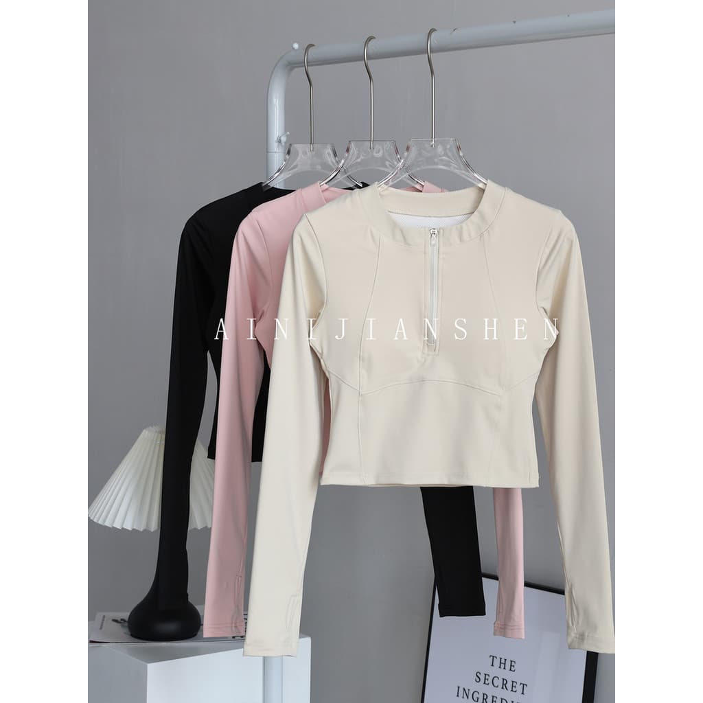 Com almofada no peito Yoga Wear topo feminino outono inverno novo estilo meio zíper mais magro olhar esportes de manga c