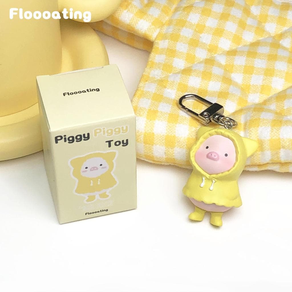 Desenhos animados dos desenhos animados capa de chuva Piggy pingente bonito amarelo roupas porco chaveiro estudante casa