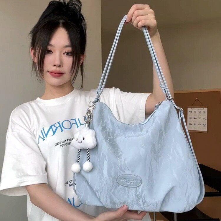 Prata mochila de viagem feminina 2026 novo estilo na moda bolsa de ombro grande capacidade Multi-Purpose Cross-Body bald