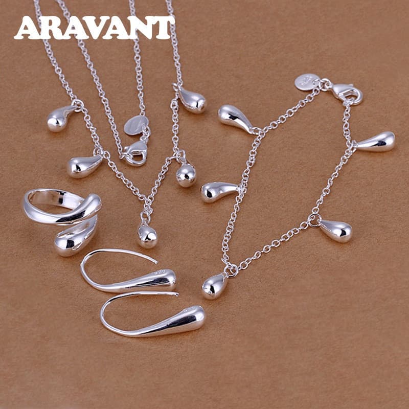Conjunto de joias Aravant em prata 925, colar com pingente em formato de gota d'água, pulseira, brincos e anel aberto, e