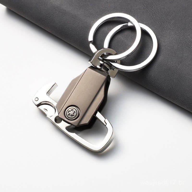 Suporte de Telefone Multifuncional com Chaveiro Rotativo em Liga de Zinco com Rotação de 360 Graus °     Brinquedo girat