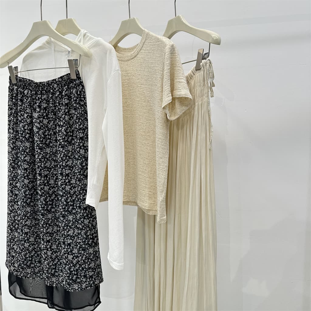 Fundo preto pequeno Floral costura em camadas saia Design feminino sentir temperamento mais magro olhar cintura elástica